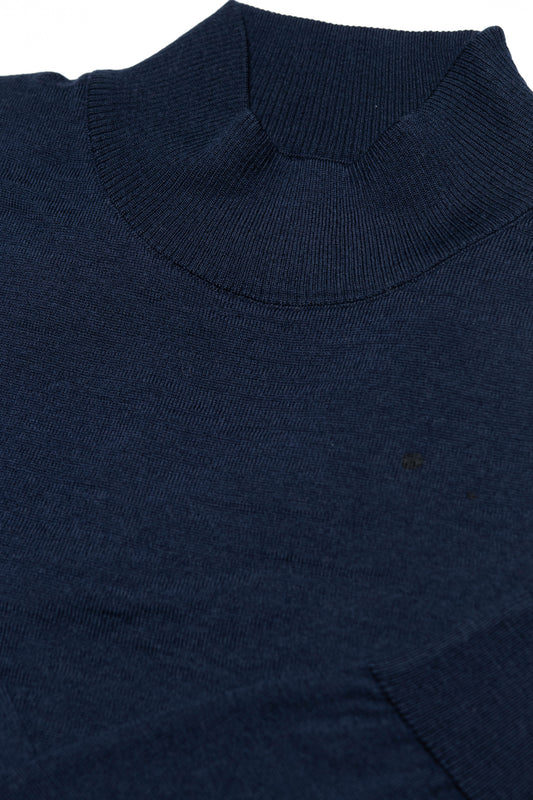 Introducing the men's mock neck sweater - navy by Bagozza Americas - the perfect combination of quality, comfort, and style. Made with premium materials and designed with the modern man in mind, this sweater is ideal to elevate your winter wardrobe. Shop now and experience the Bagozza difference.