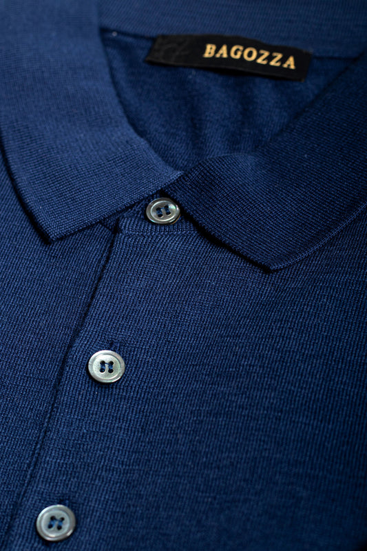 Introducing the Short Sleeve Knit Polo - Navy 6296 by Bagozza Americas - the perfect combination of quality, comfort, and style. Made with premium materials and designed with the modern man in mind, these polo shirts are perfect for any occasion. Choose from a variety of colors and styles to elevate your wardrobe. Shop now and experience the Bagozza difference.
