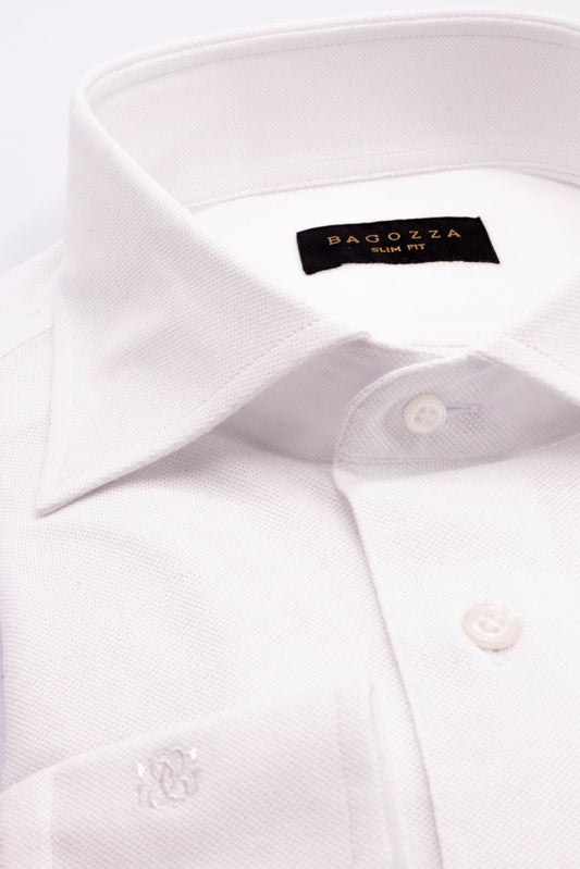 Introducing Bagozza Americas Men's Slim Fit White Active Textured Shirt with Spread Collar (13080) - a stylish, high-quality shirt crafted from 100% cotton, our shirts are designed to be comfortable and long-lasting. Experience the premium quality and craftsmanship of Bagozza Americas.