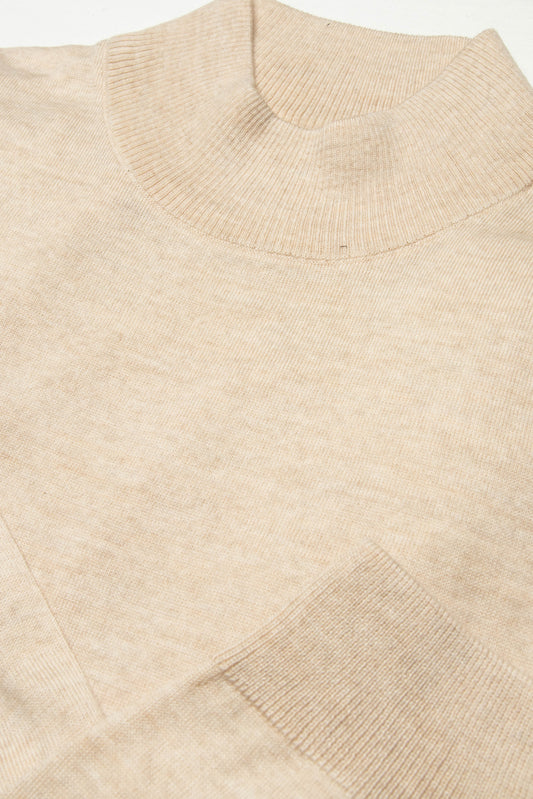Introducing the men's mock neck sweater - beige by Bagozza Americas - the perfect combination of quality, comfort, and style. Made with premium materials and designed with the modern man in mind, this sweater is ideal to elevate your winter wardrobe. Shop now and experience the Bagozza difference.