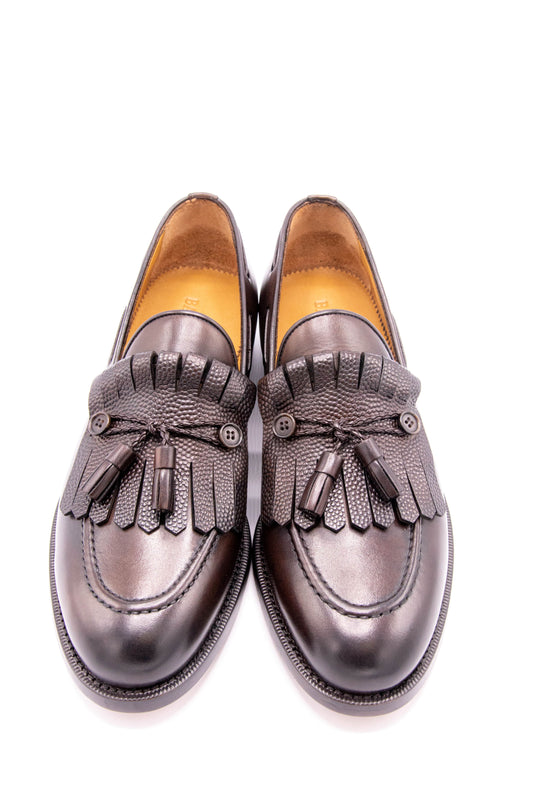 Step out in style with Bagozza Americas' Genuine Leather Men's Kiltie Loafer Shoe in Brown (7367). Our handcrafted shoes are made in Italy using traditional methods and the finest materials. With multiple safe and secure payment options and easy delivery, ordering your next pair of Bagozza shoes has never been easier. Shop now and step up your shoe game!